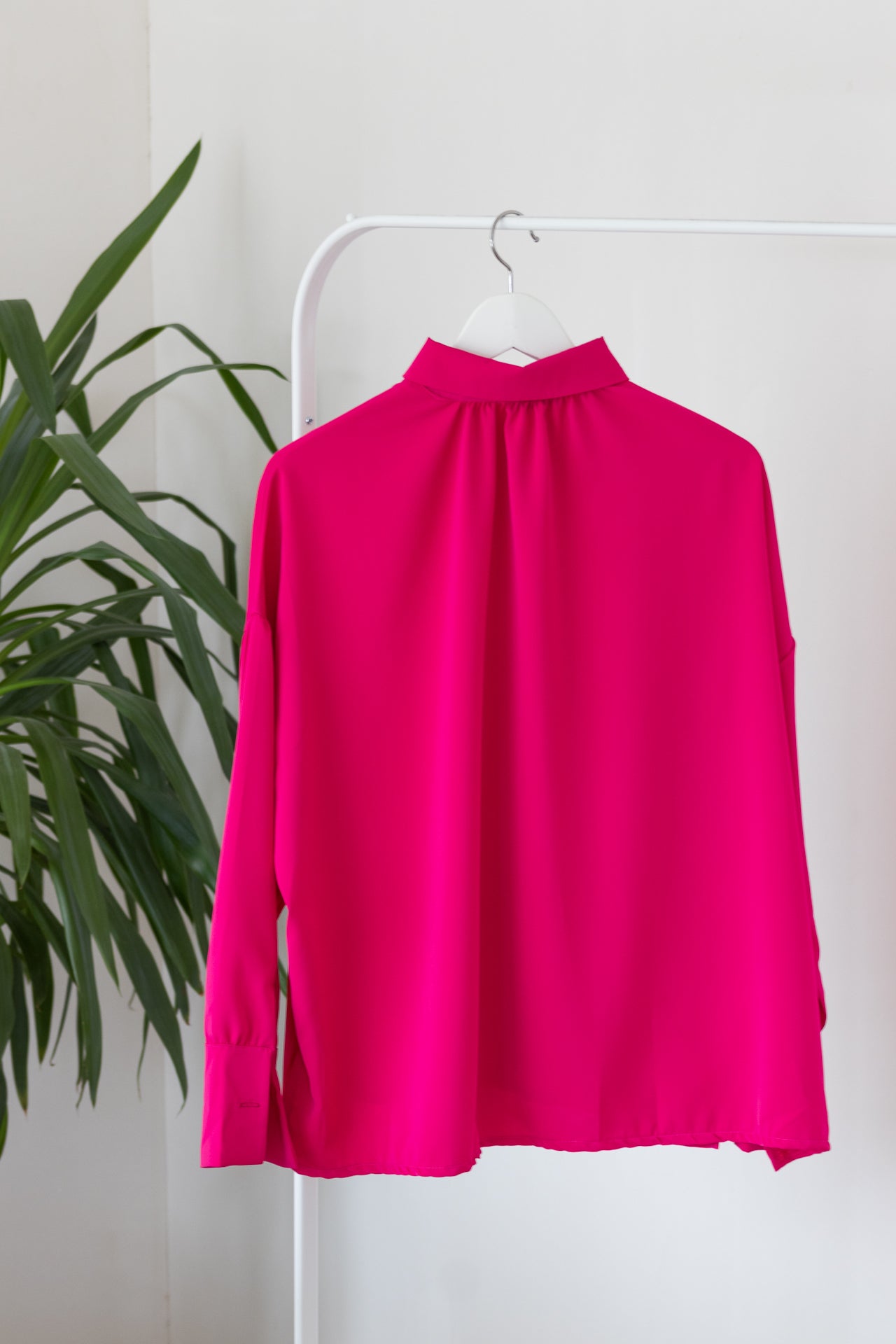 Roze blouse met lange mouwen