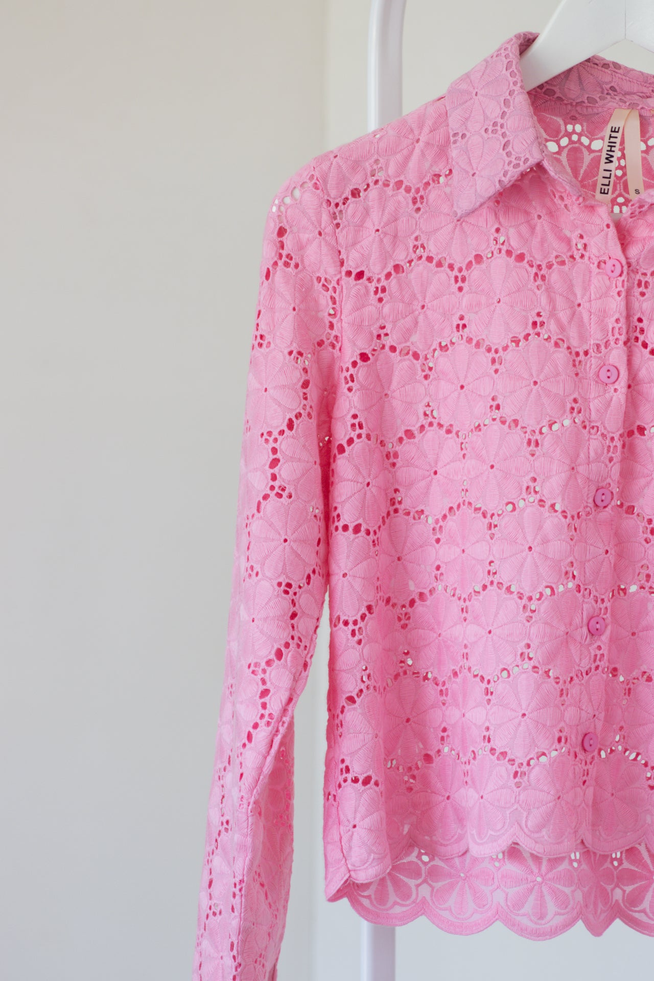 Roze blouse met bloemendetail