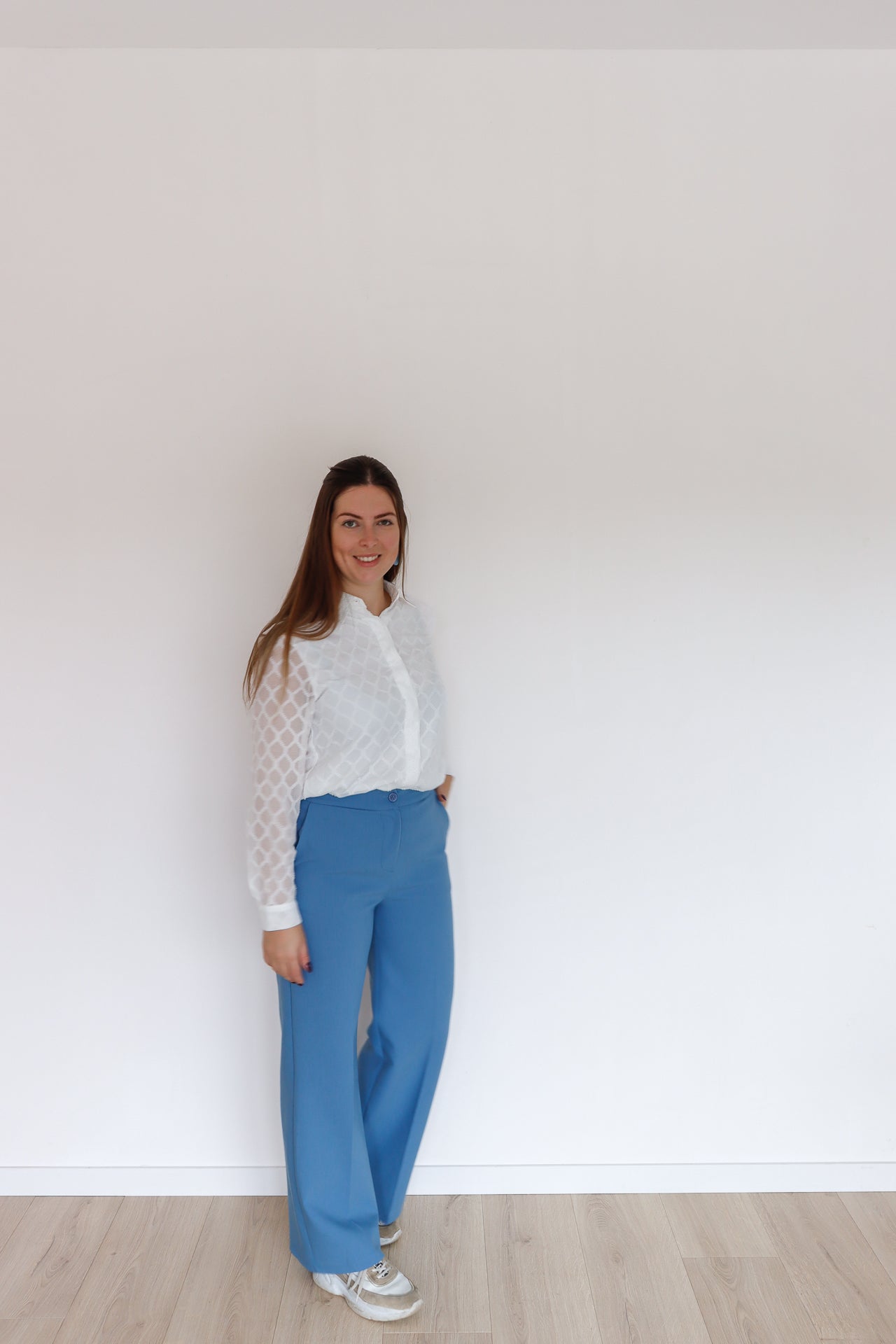 Witte blouse met kanten mouwen