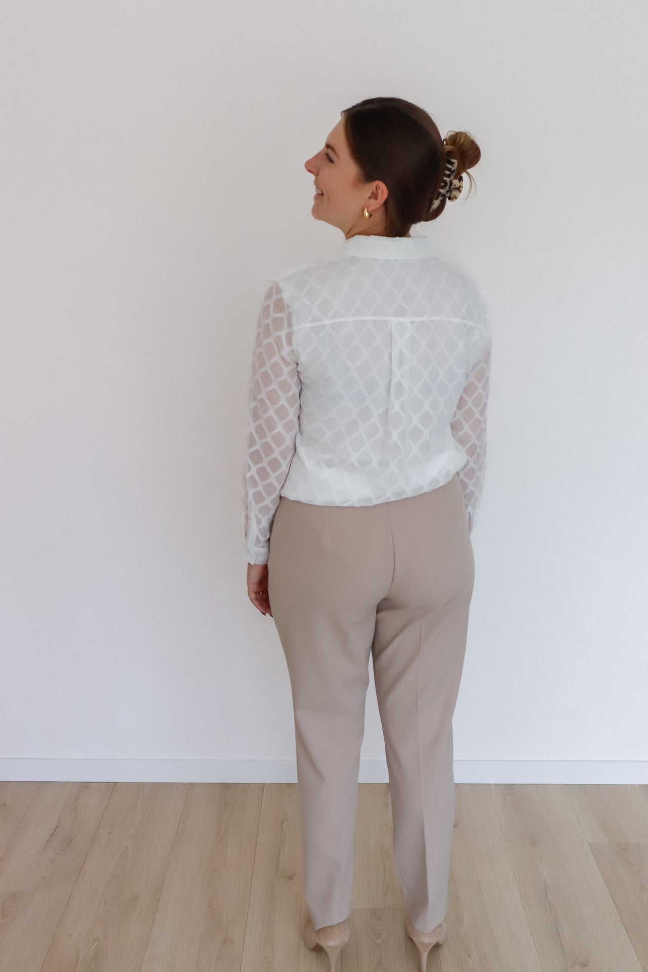 Witte blouse met kanten mouwen